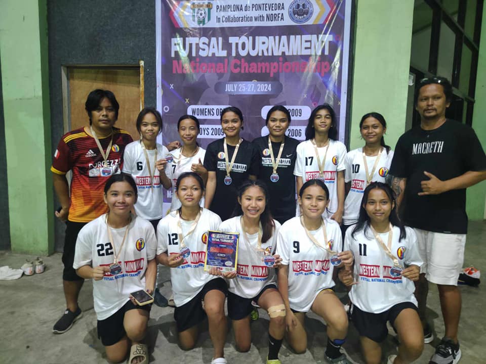 R. MCHEAVEN women’s futsal team from a Philippine football club celebrating third place at the 2024 National Futsal Championship
