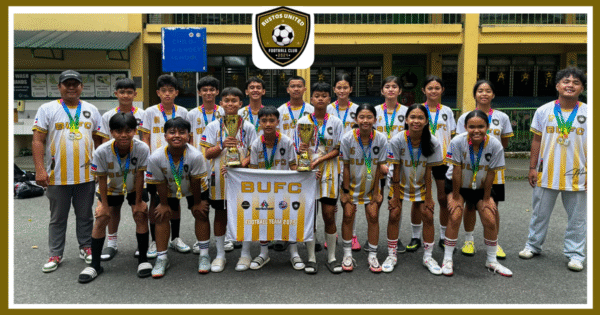 Bustos United Football Club youth players pose with trophies after a tournament win, representing grassroots Philippine football development in Bulacan.