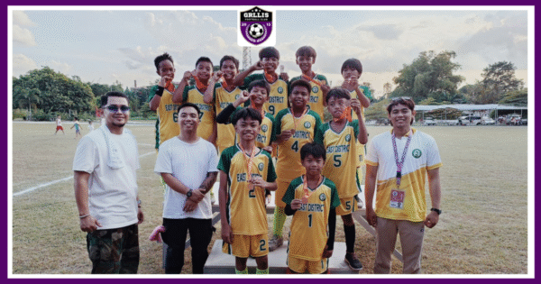 GRLLIS Football Club youth players posing with coaches after winning medals at the Angeles City Public Meet football tournament.