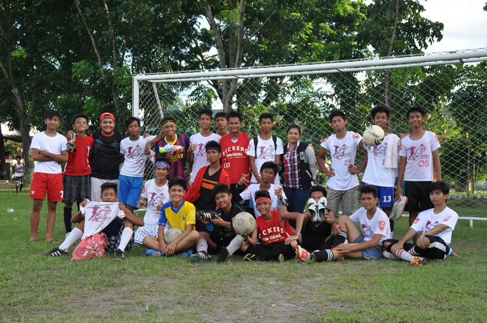 GRLLIS Football Club youth players posing in front of a goalpost during training, representing a grassroots Philippine Football Club in Angeles City.