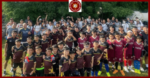 Sta. Mesa Football Club players, coaches, parents, and supporters gather for a group photo during a grassroots football community event in Sta. Mesa, Manila.