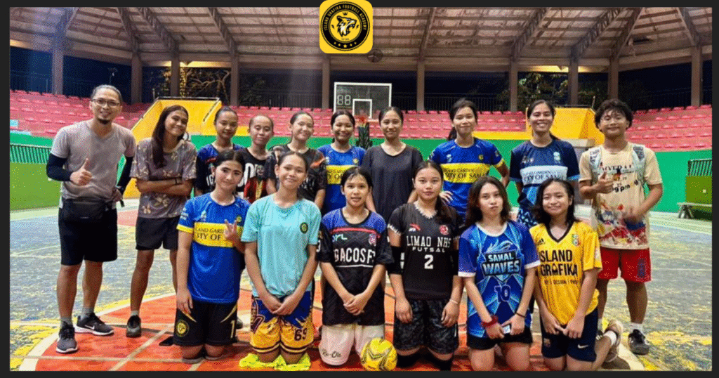 Players and coaches of Island Grafika Football Academy pose for a group photo after a futsal training session in Island Garden City of Samal, Philippines.