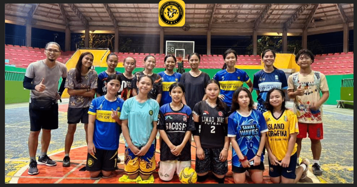 Players and coaches of Island Grafika Football Academy pose for a group photo after a futsal training session in Island Garden City of Samal, Philippines.