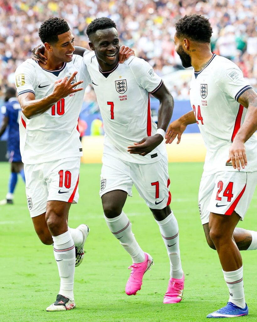 Bukayo Saka celebrates with England teammates after scoring against France in the 2026 FIFA World Cup third-place playoff.