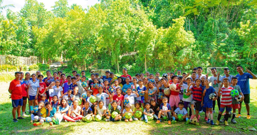 Razkals United FC youth players and coaches during a grassroots football activity in Cebu